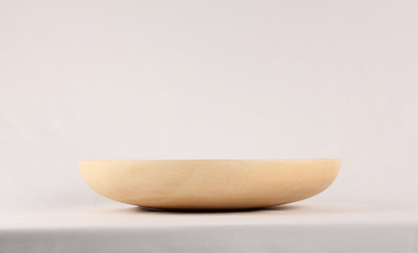 Side view of a mango wood plate